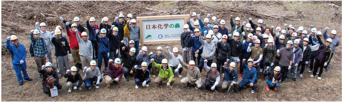 株式会社日本化学工業所と地域の方たちの集合写真